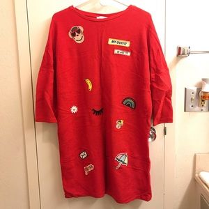 Red dress with cute patches from Zara